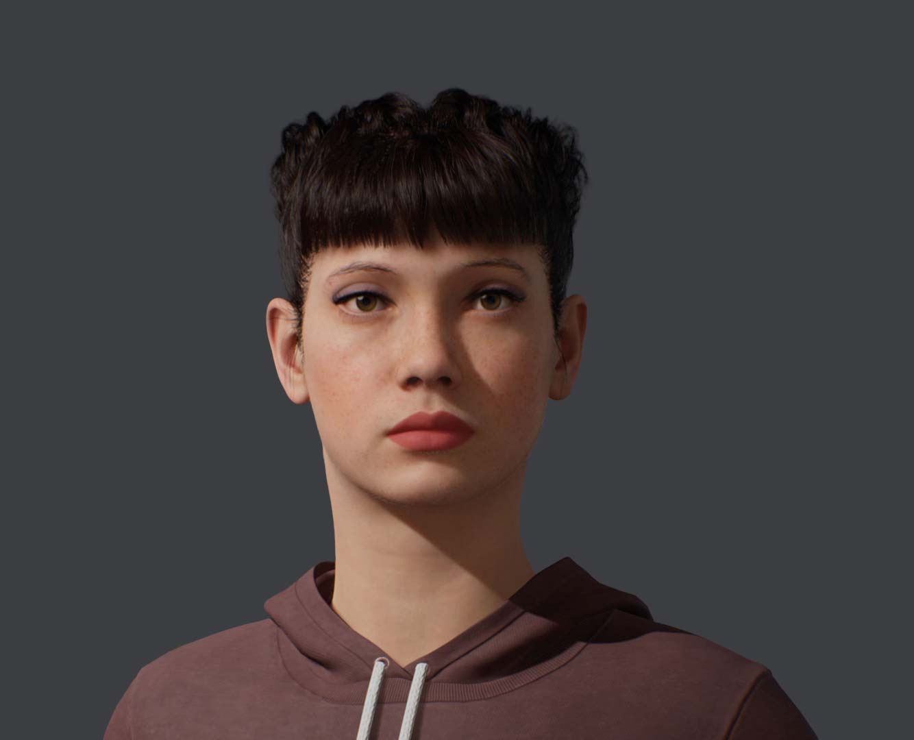 a woman with short hair wearing a hoodie